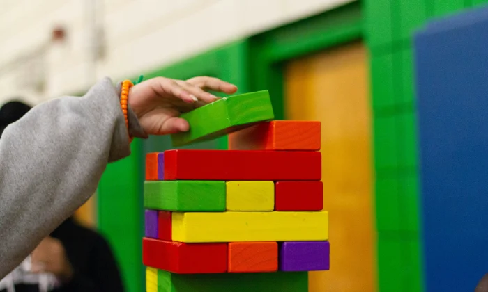 Child playing with building blocks